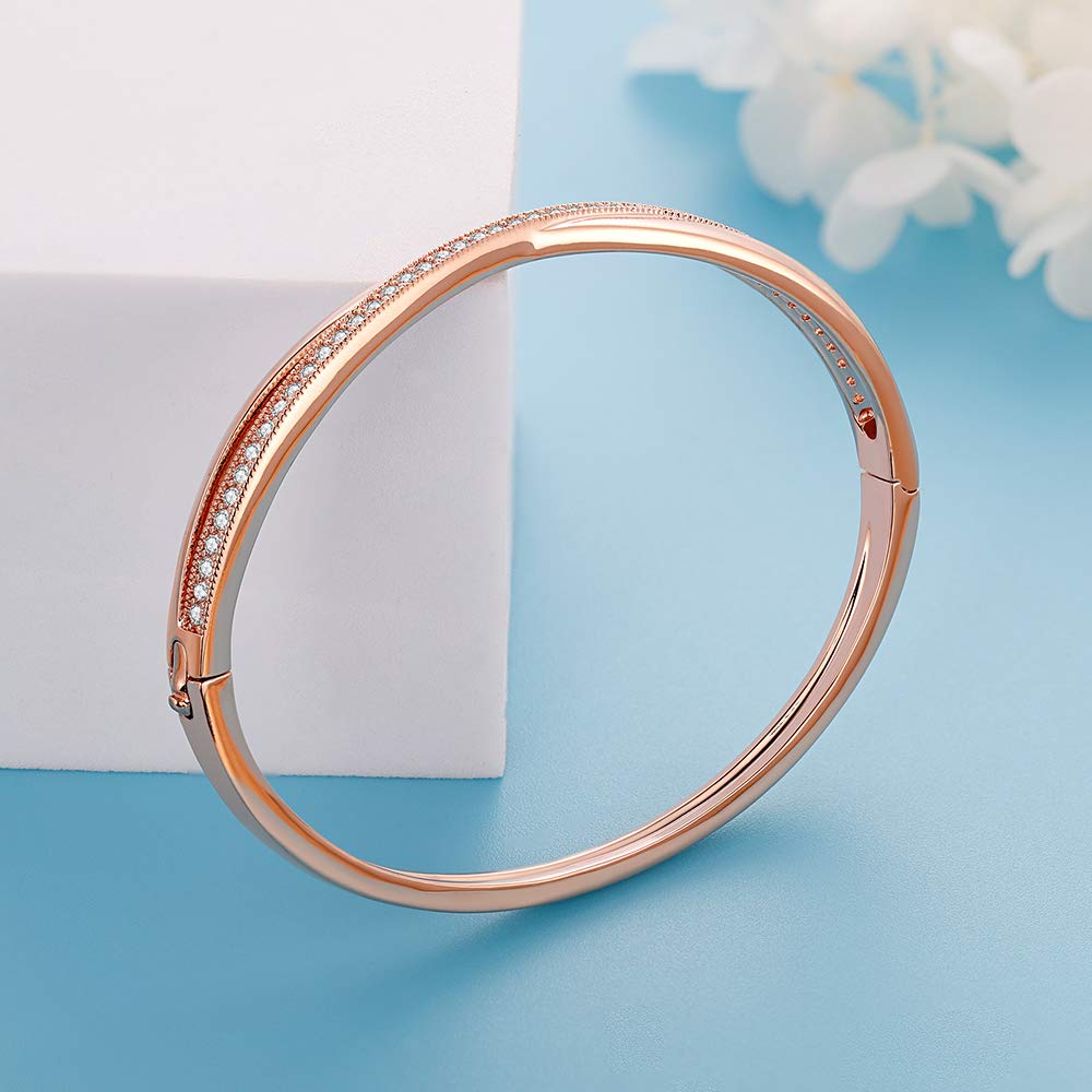 Twisted rose gold-bangle with radiant white crystal accents