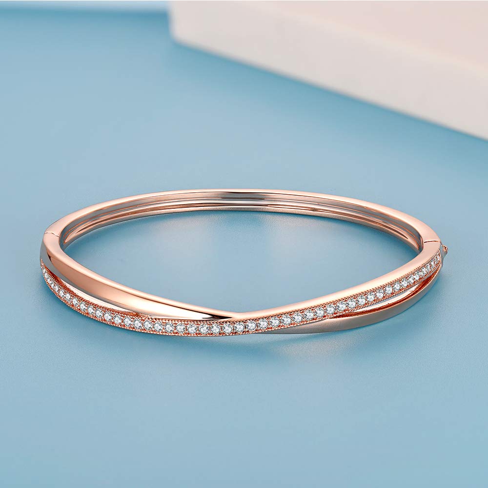 Twisted rose gold-bangle with radiant white crystal accents